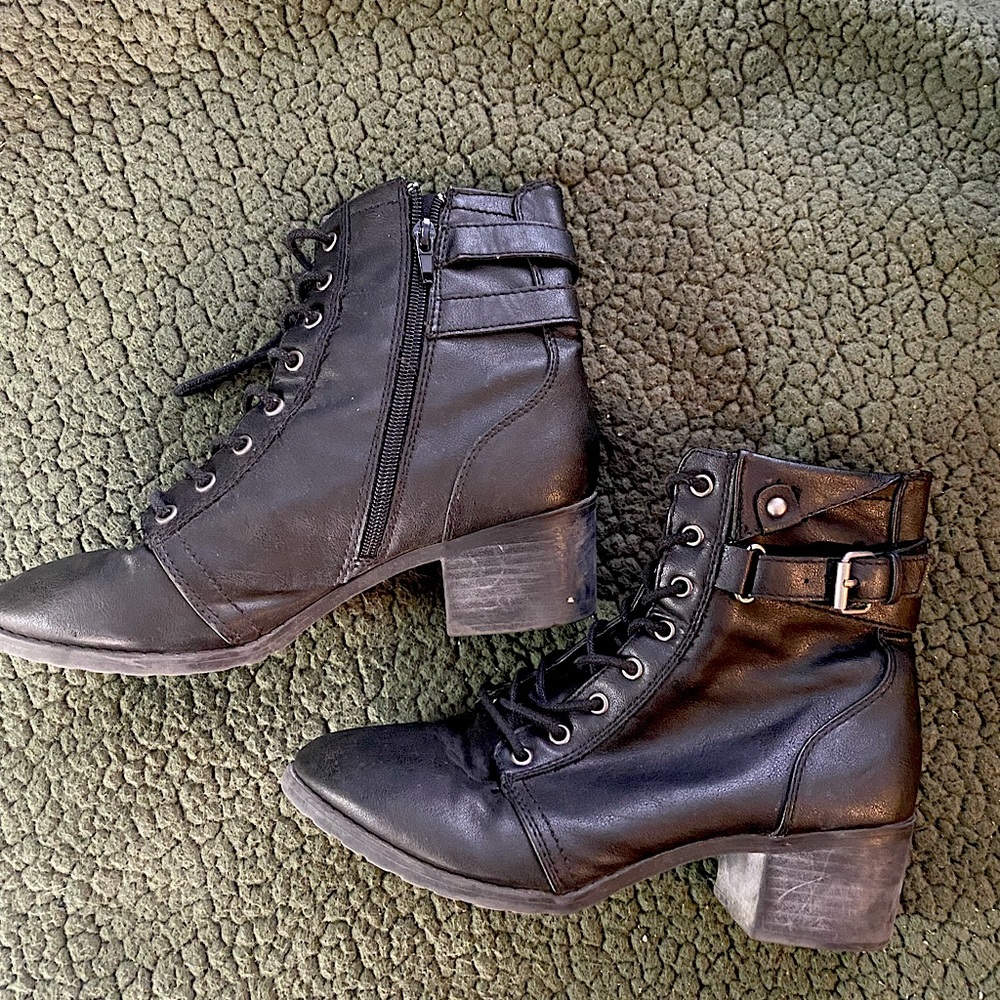 Black zip up boots.  Combat style with short heel. Women’s Size 8.5